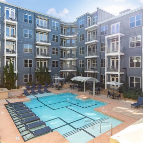 Relax and Unwind Poolside resort style pool with seating