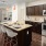 a kitchen with a marble island