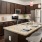 a kitchen with a marble island