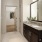 a bathroom with a large mirror
