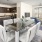 a large kitchen with a dining table